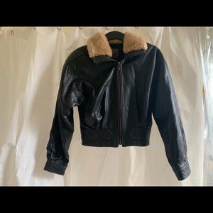 Black real leather jacket.